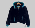 CÔTÉ PELUCHE DE LA VESTE RÉVERSIBLE PEOPLE OF