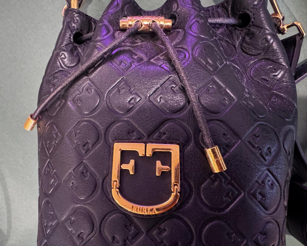 FURLA EMBOSSED MONOGRAM LEATHER BUCKET BAG